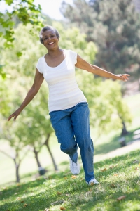 Senior woman exercising in park